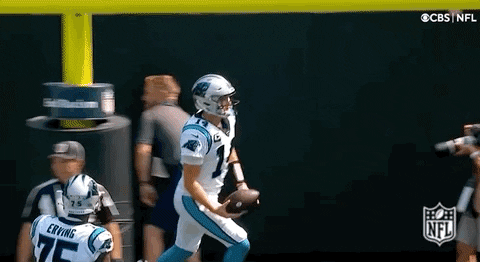 Sam Darnold Throwing The Ball Then Running GIF