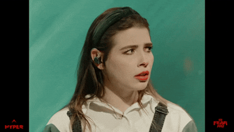 Sam Seum Ear Plugs While Wearing Headband GIF