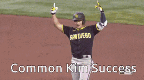 San Diego Baseball Player Celebrating Arms in Air