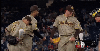 San Diego Baseball Players Shake Hands With Each Other During A Game GIF