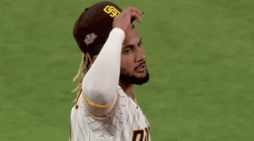 San Diego Padres Player Covering Eyes