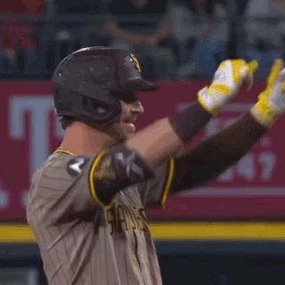 San Diego Padres Player With Helmet and Yellow Gloves