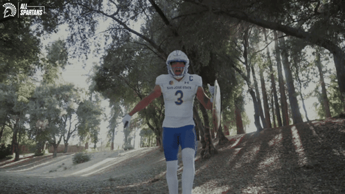 San Jose State Spartans Football Player Running Through Woods
