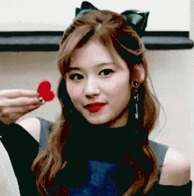 Sana Holding A Cute Little Red Heart GIF