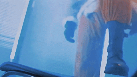 Santa Claus Commando Wielding Guns GIF