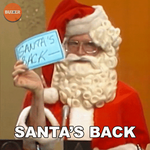 Santa Claus Holding Santas Back Sign GIF