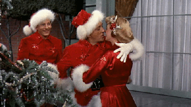 Santa Claus Hugging Woman GIF
