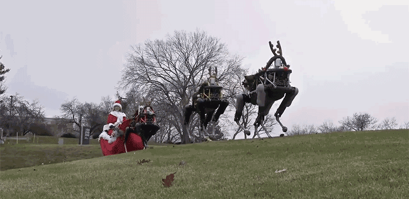 Santa Claus Robot Sleigh Reindeers GIF