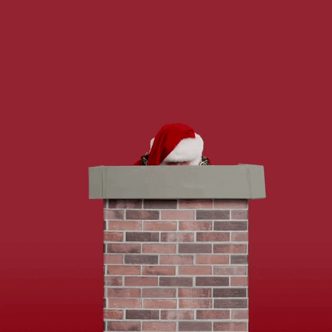 Santa Claus Showing From Chimney GIF