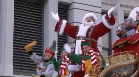 Santa Claus With Elves Waving GIF