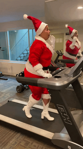 Santa Happily Exercising GIF