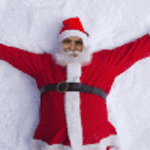 Santa Laying on Snow With Arms Outstretched