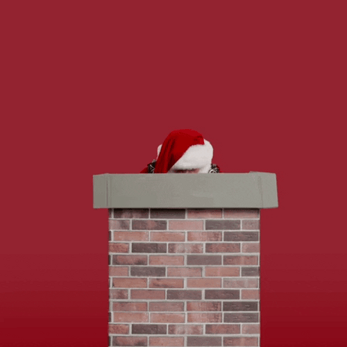 Santa Showing In The Chimney GIF