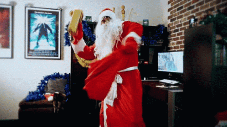 Santa Throwing Gifts GIF
