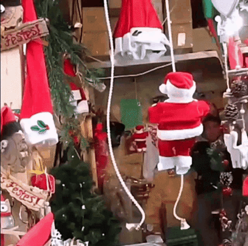 Santa Toy Climbing With Rope GIF