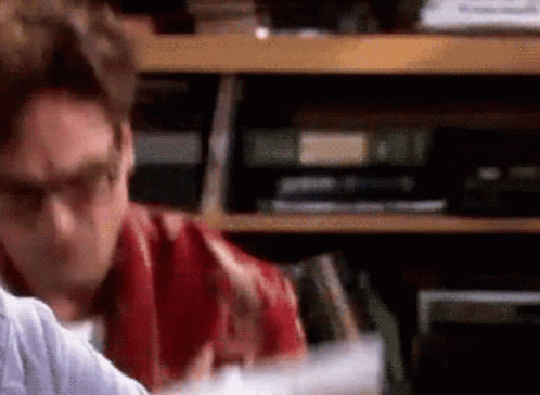 Guy Showing Sarcasm Written On A Paper GIF