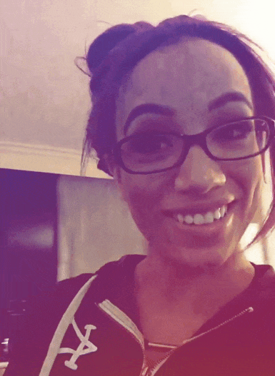 Sasha Banks Finger Bite Wearing Eyeglasses GIF