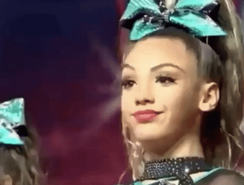 Sassy Chearleader Wearing Big Ribbon GIF