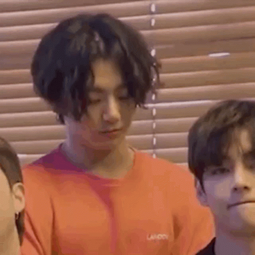 Sassy Korean Dude Wearing Orange Shirt GIF