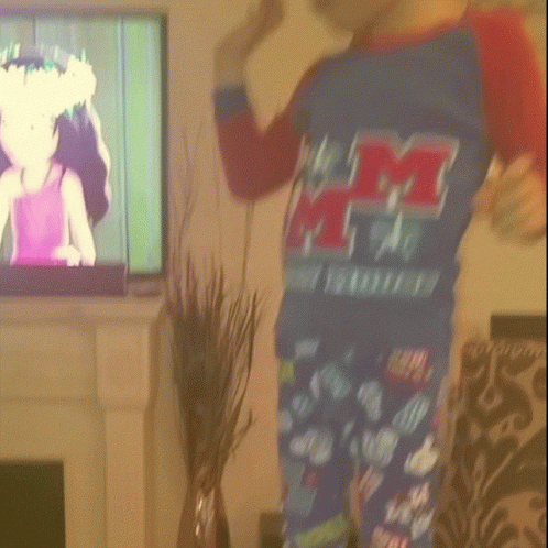 Sassy Little Boy In Pajamas And Glasses GIF