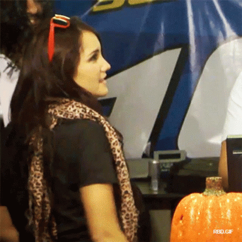 Sassy Girl Biting Giant Bone GIF