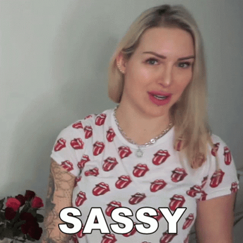 Sassy Girl Wearing Shirt With Rolling Stone Logos GIF