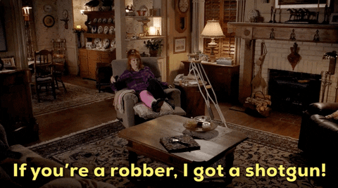 Sassy Housewife Warns Robber GIF