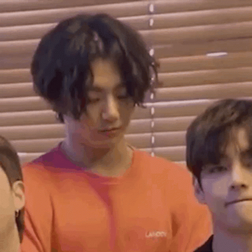 Sassy Korean Dude Wearing Orange Shirt GIF