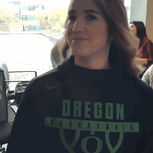 Sassy Lady Wearing Oregon Shirt GIF