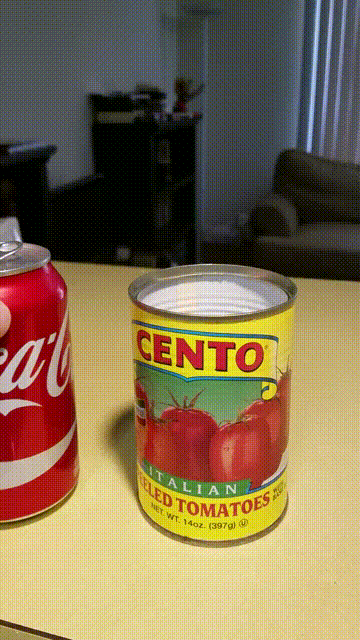 Satisfying Coke Tomato Cans GIF