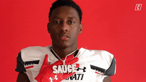 Sauce Gardner Flexing His Necklace GIF