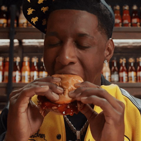 Sauce Gardner Taking Bite Out Of Sandwich GIF