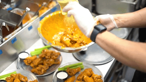 Saucing The Chicken Wing GIF