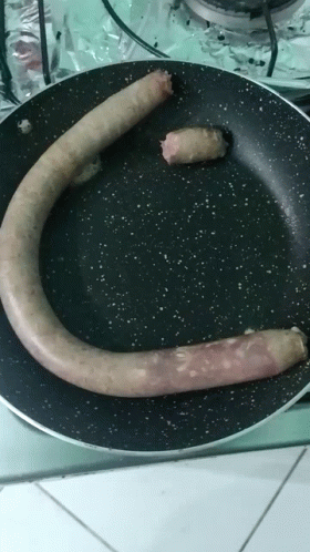 Raw Sausage In A Pan GIF