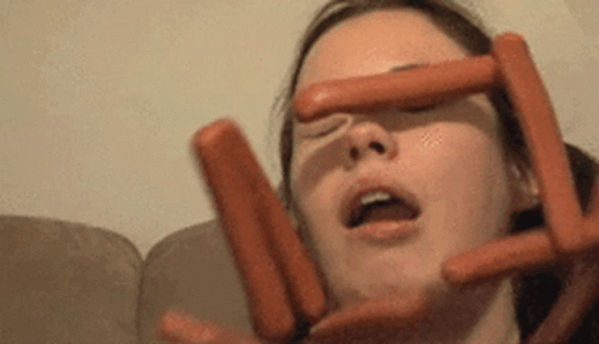 Sausage Party On Girl's Face GIF