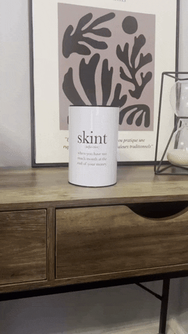 Save Money Hand Dropping Coin Into Can GIF