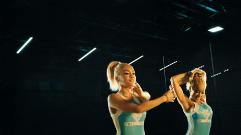 Saweetie Sassy Arm Stretch Moves GIF