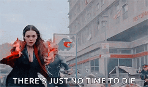 Scarlet Witch Is Holding A Fireball In Front Of A Building And Says `` There 'S Just No Time To Die `` . GIF