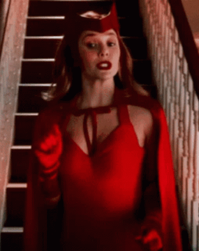 Scarlet Witch Woman Pointing At Camera On Stairs GIF