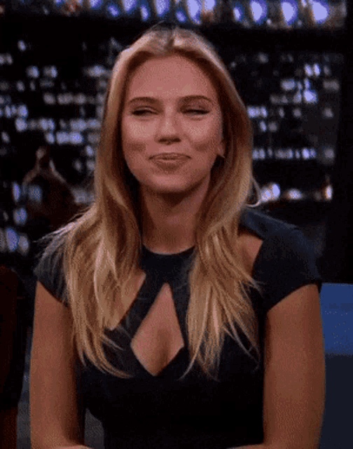 Scarlett Johansson Interview Shrug Laugh GIF
