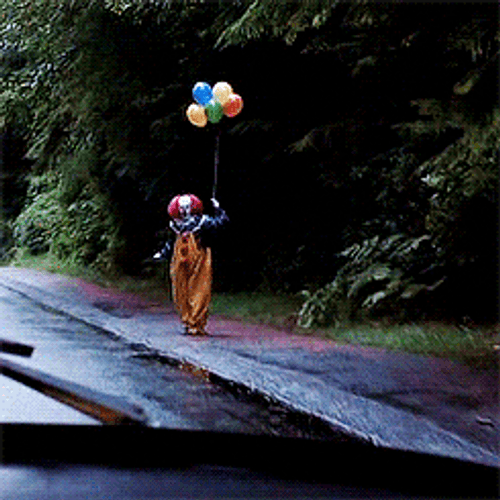 Scary Clown With Balloon GIF
