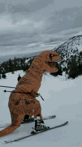 Scary Dinosaur Skiing Snow GIF
