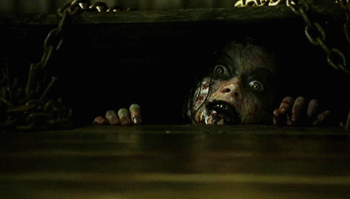 Scary Face Peeking Out of Hole