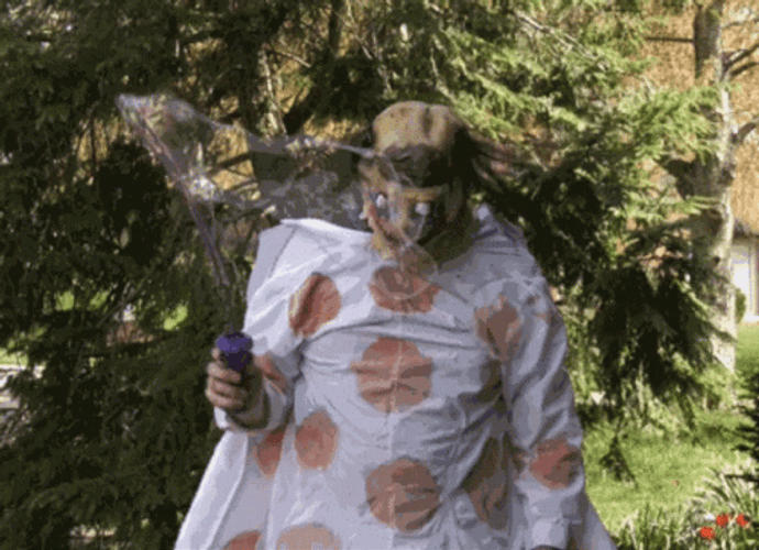 Scary Mask Man With Bubbles GIF