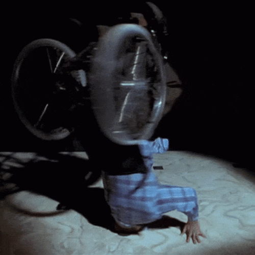 Scary Movie Wheel Chair Head Spin  GIF