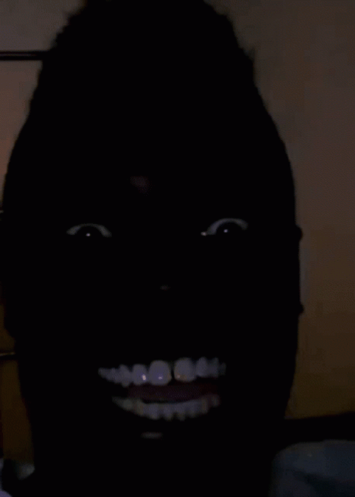 Scary Smiling Black Man GIF
