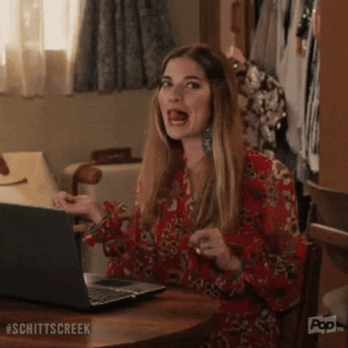 Schitt's Creek Annie Murphy Flip Hair GIF