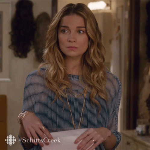 Schitt's Creek Woman Holding Purse GIF
