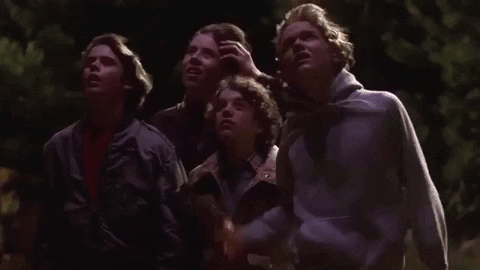 Sci-fi Et Family Looking At The Flying Spaceships GIF