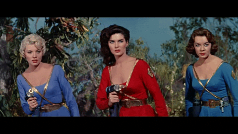 Sci Fi Queens Of Outer Space Holding Raygun GIF
